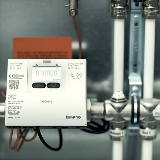 Heat meter display showing consumption readings in MWh
